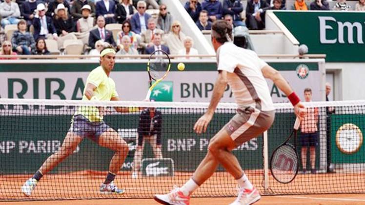 लाल बजरी के बादशाह राफेल नडाल और स्विस दिग्गज पोजर फेडरर (@rolandgarros)
