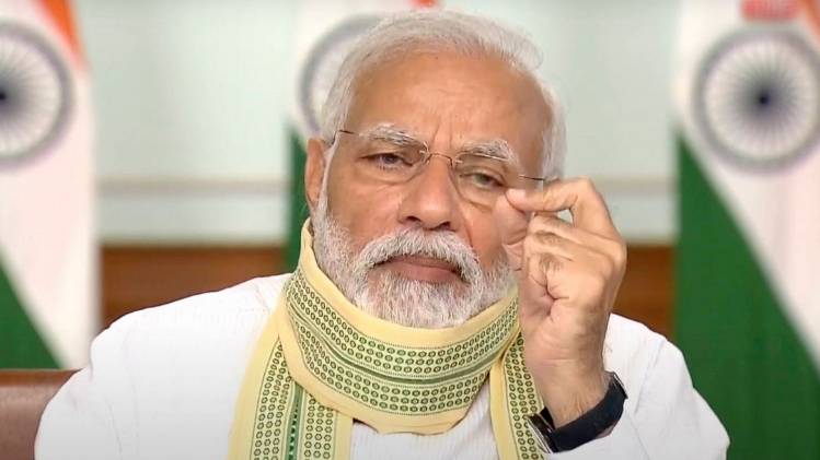 रेडियो कार्यक्रम 'मन की बात' में पीएम मोदी ने देश को कर रहे संबोधित (फाइल फोटो-PTI)