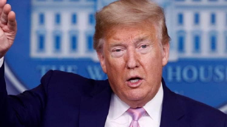 राष्ट्रपति ट्रंप शुरू से देश खोलने की वकालत करते रहे हैं (फाइल फोटो-PTI)