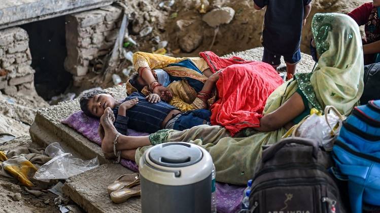 प्रवासी मजदूर का परिवार (फोटो-PTI)