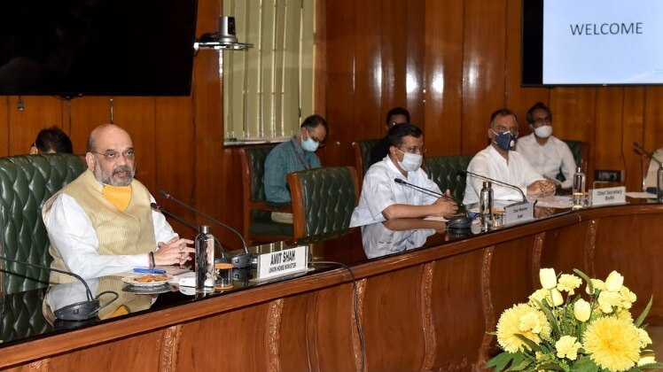 केंद्रीय गृहमंत्री अमित शाह और दिल्ली के मुख्यमंत्री अरविंद केजरीवाल (फोटो-PTI)