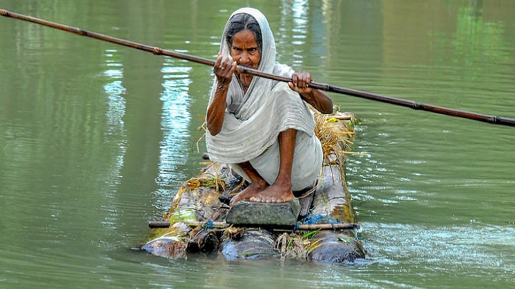 असम में बाढ़ से बुरा हाल (PTI)