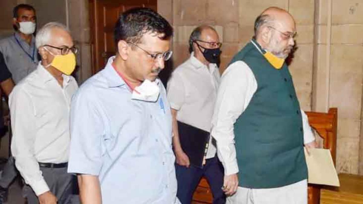 सीएम केजरीवाल और गृह मंत्री अमित शाह (फाइल फोटो)