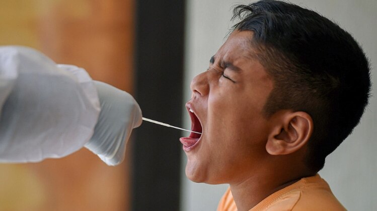 कोरोना के खिलाफ जंग में कितना सफल रहीं राज्य सरकारें (पीटीआई)