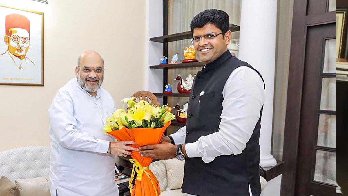 अमित शाह और दुष्यंत चौटाला (फाइल फोटो- पीटीआई)