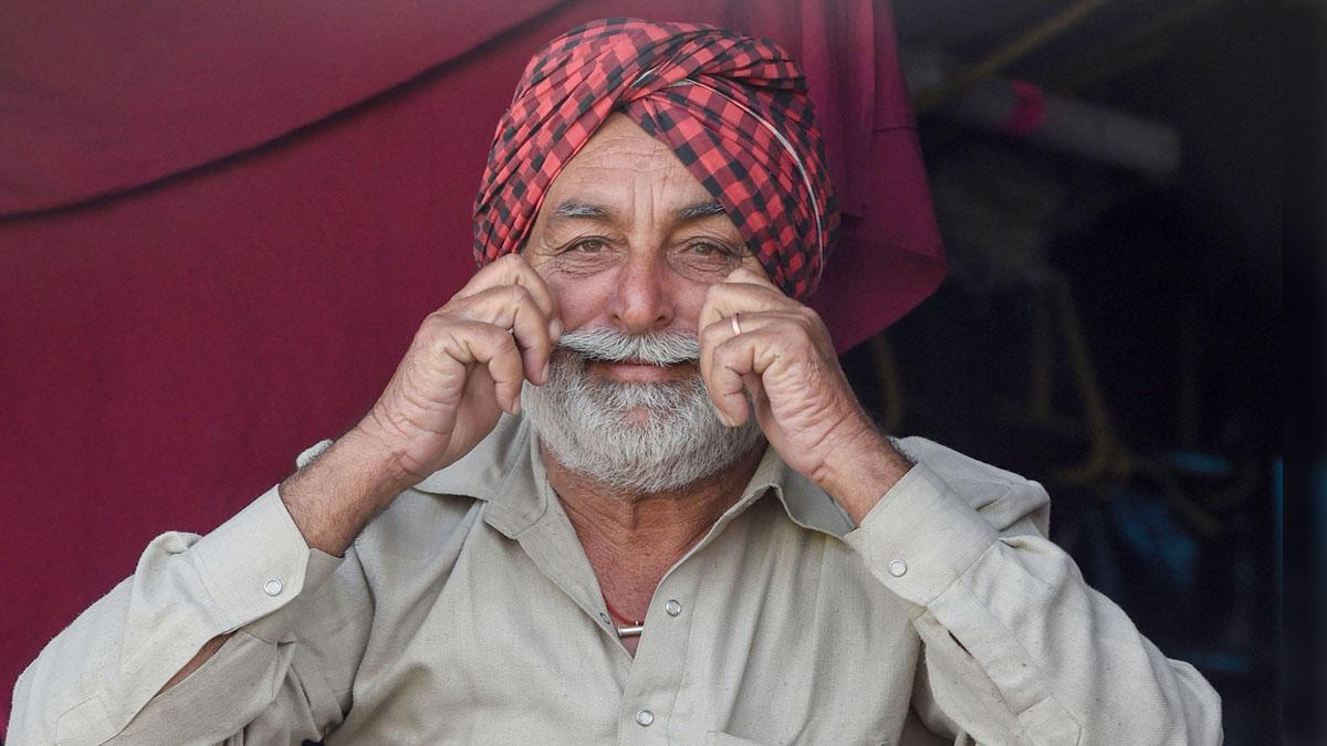 आंदोलन के दौरान एक किसान (फोटो-पीटीआई)