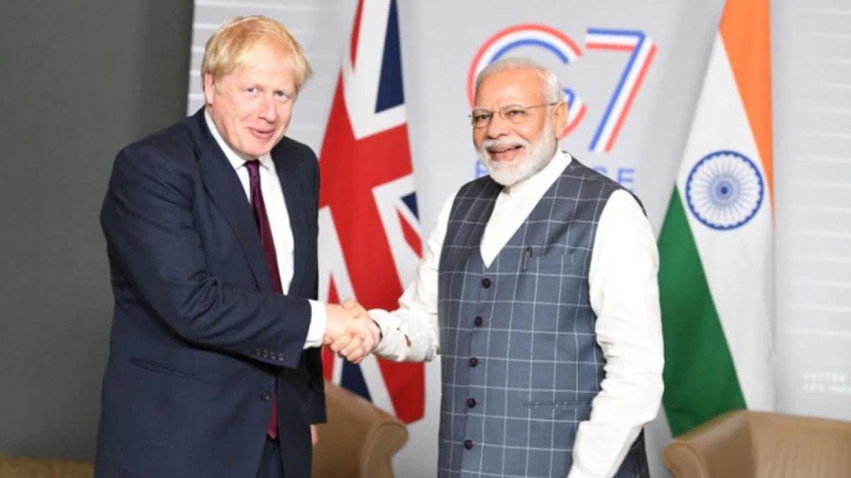 बोरिस जॉनसन के साथ पीएम मोदी (फाइल फोटो)