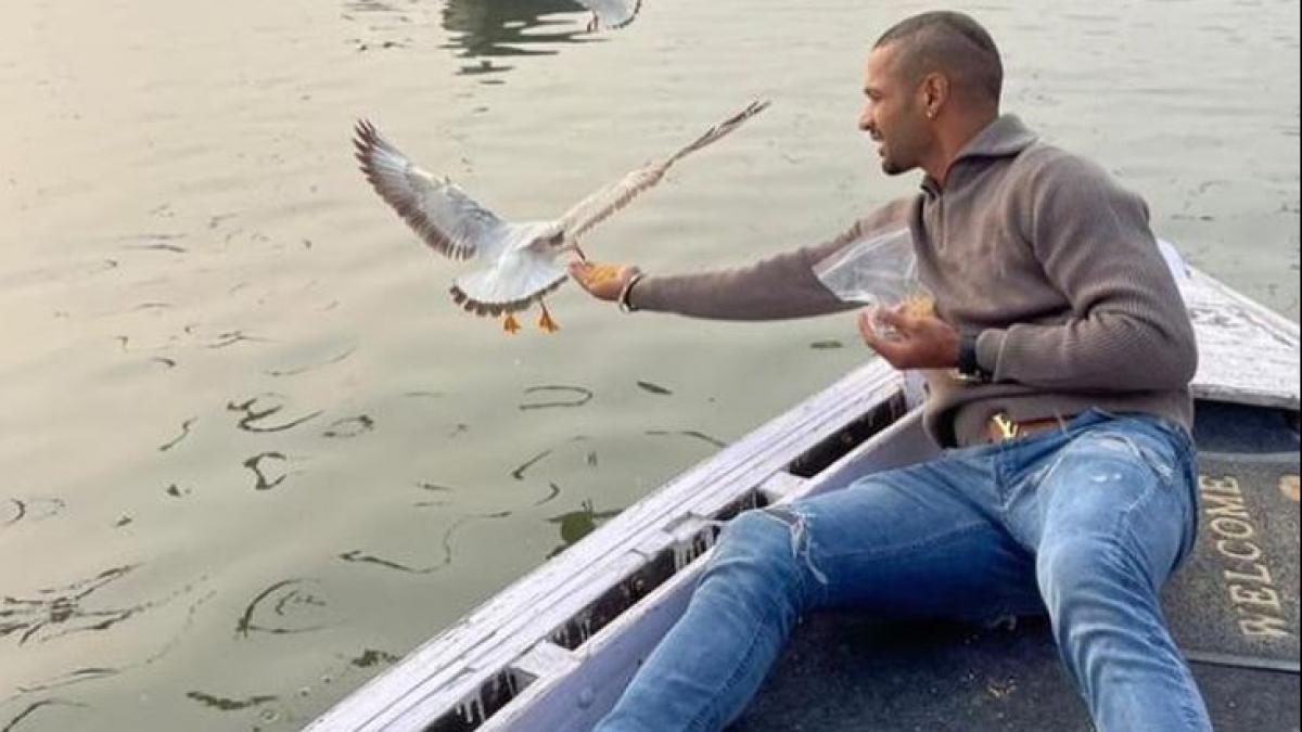 Shikhar Dhawan Feeds Birds in Varanasi