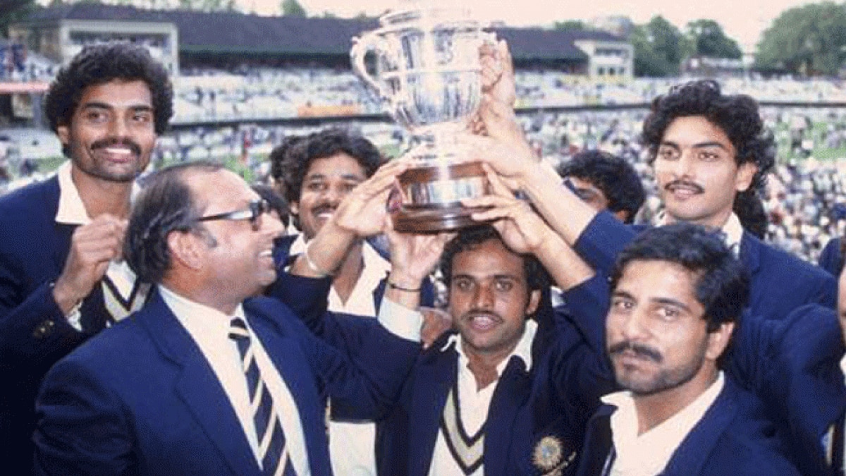 Indian team members proudly hold aloft the trophy (Getty)