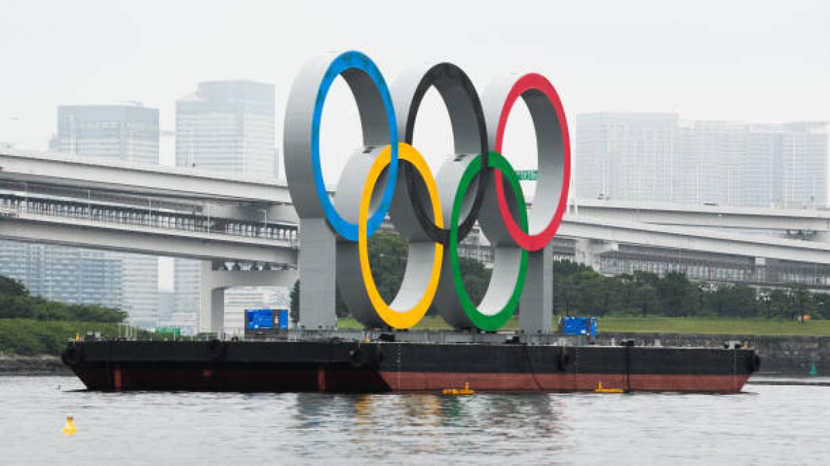 The Olympic rings float in Tokyo Bay near Odaiba Marine Park. (Getty)