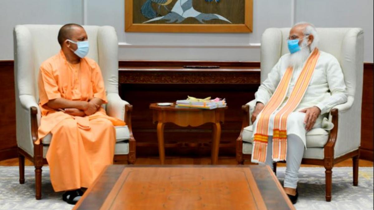 यूपी के सीएम योगी और पीएम नरेंद्र मोदी (फोटो-पीटीआई)
