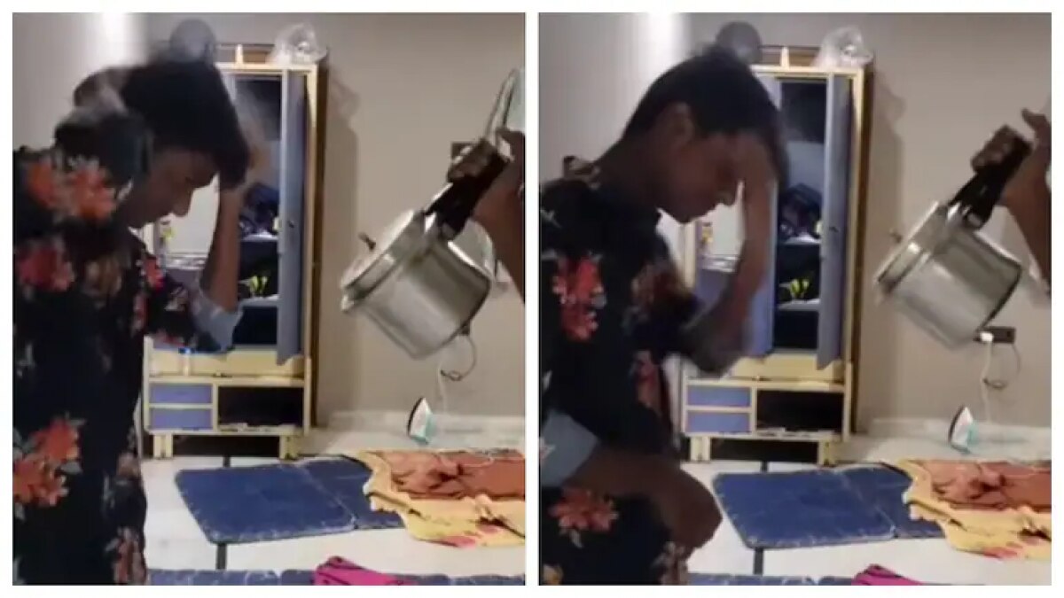 कुकर के भाप से बाल सुखाता लड़का