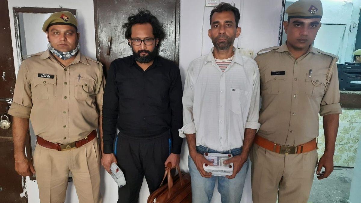 पुलिस की गिरफ्त में आरोपी. (Photo: Aajtak)