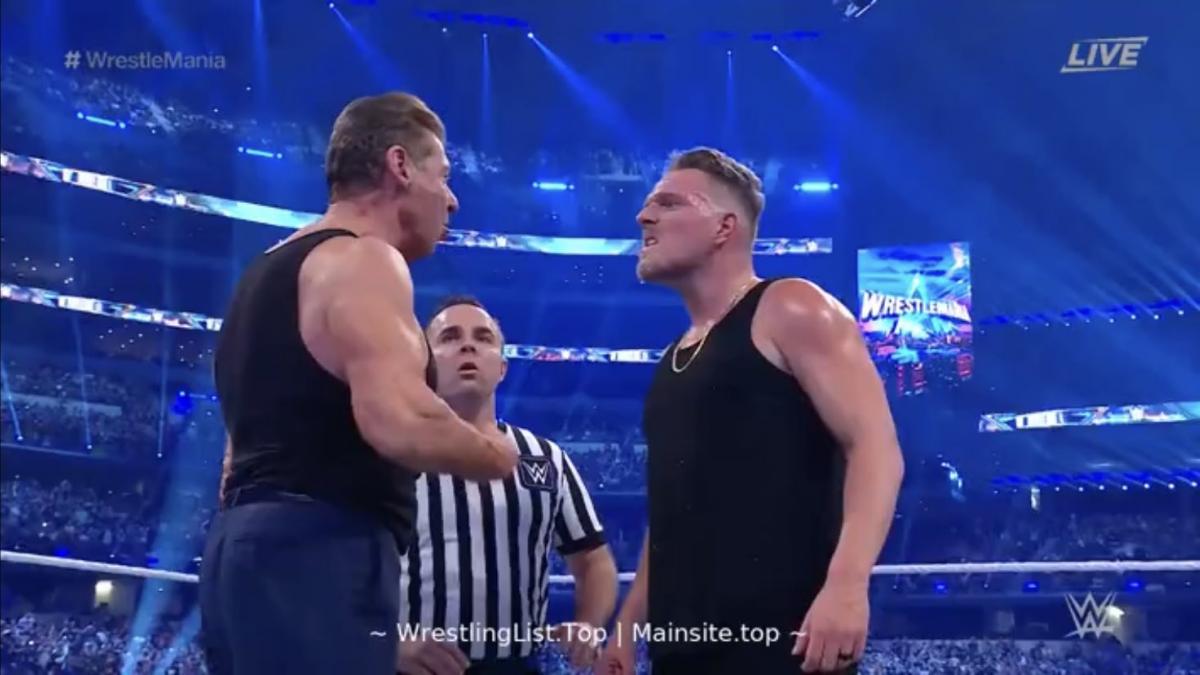 Vince McMahon (left)