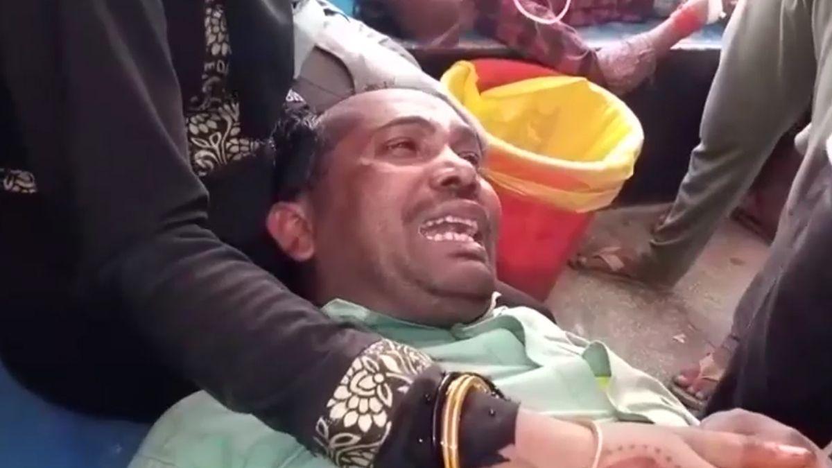 अस्पताल में भर्ती पीड़ित दुकानदार. 