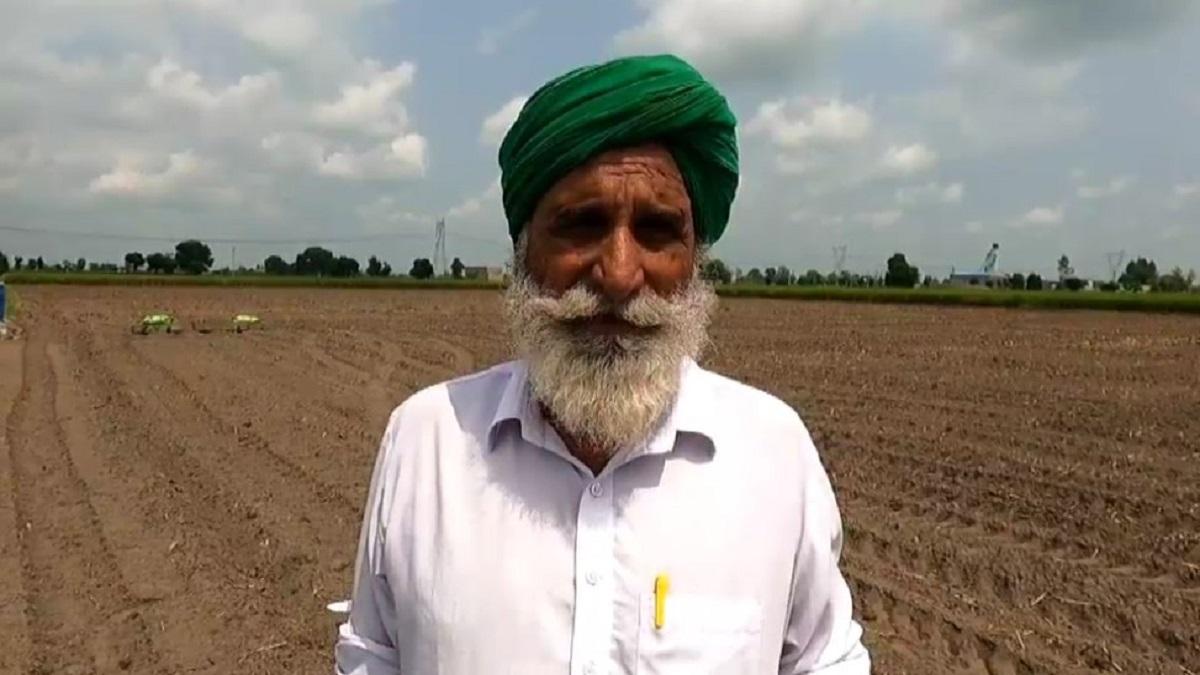 Farmer drove the tractor on the crop