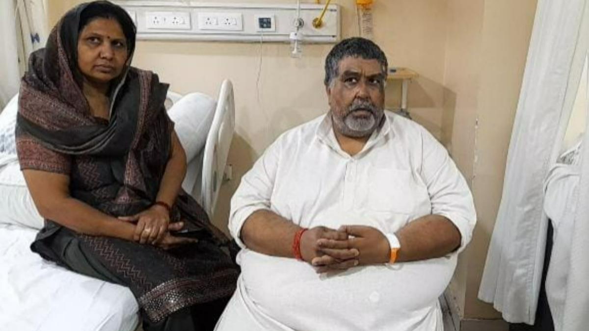 संजय शर्मा और उनकी पत्नी