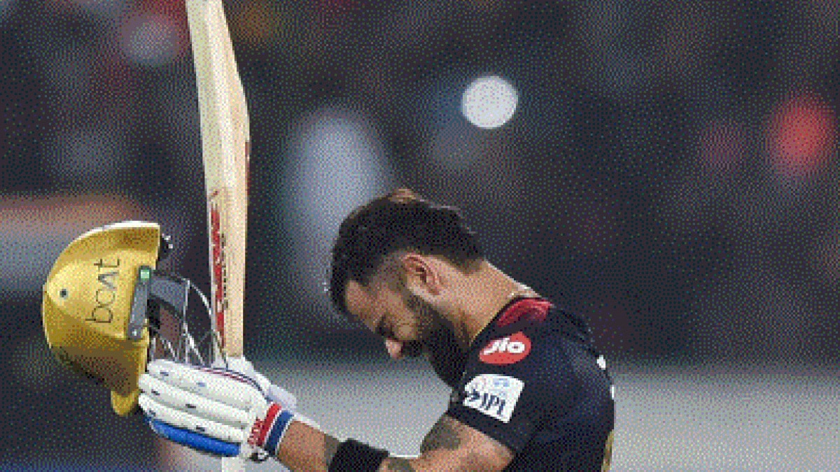  Virat Kohli celebrates after scoring a century. (Getty)