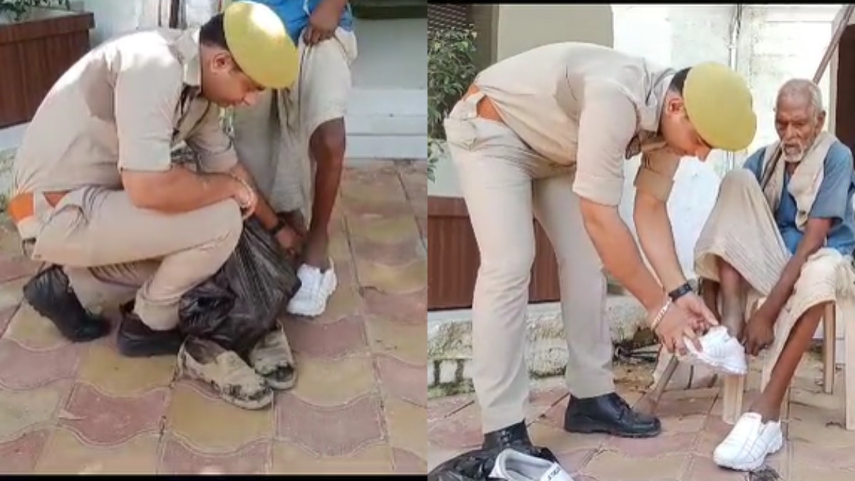 बुजुर्ग को जूते पहनाते सिपाही निशांत.