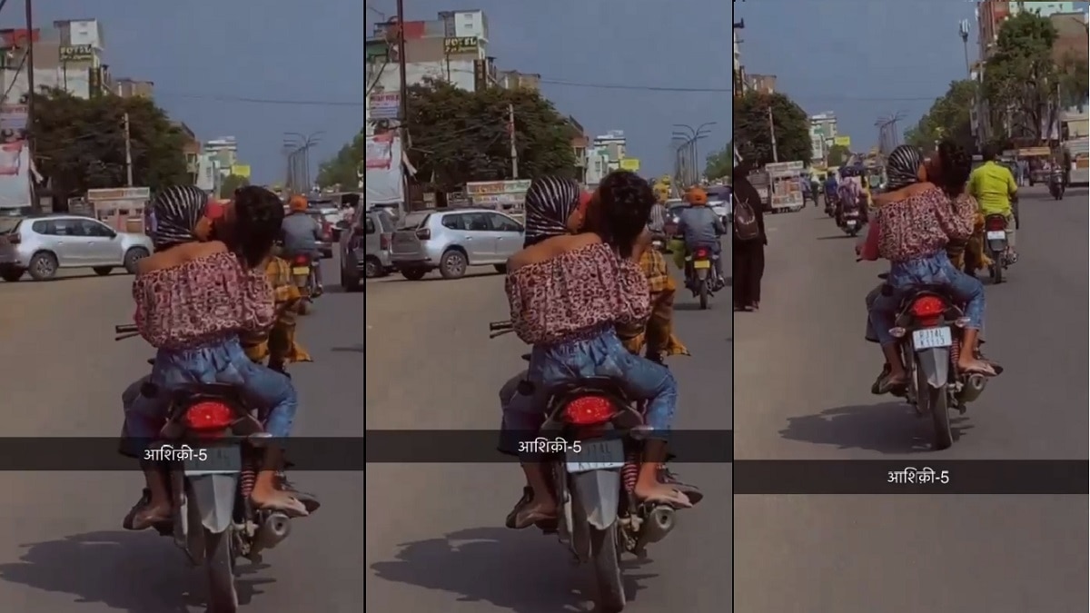 जयपुर में कपल ने किया बाइक पर रोमांस (Screengrab).