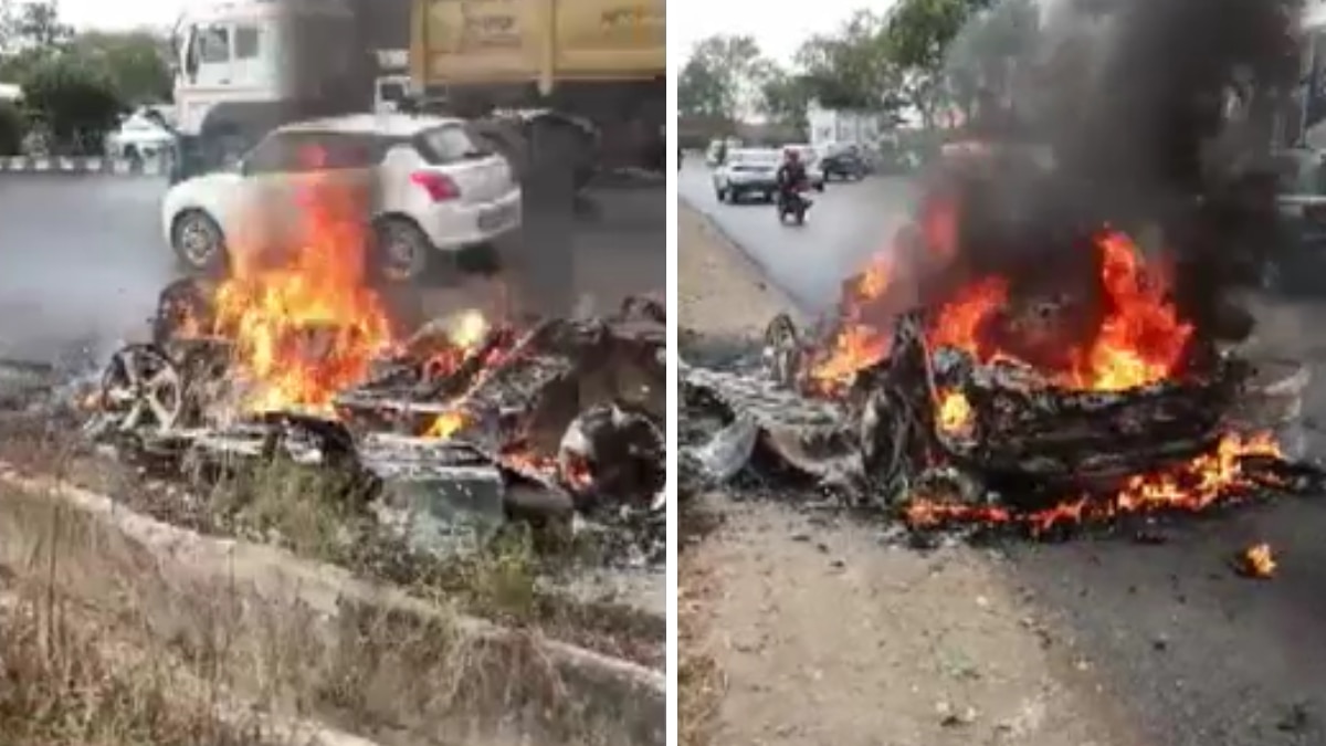 दिल्ली-जयपुर हाइवे पर एक जगुआर कार में आग लग गई.