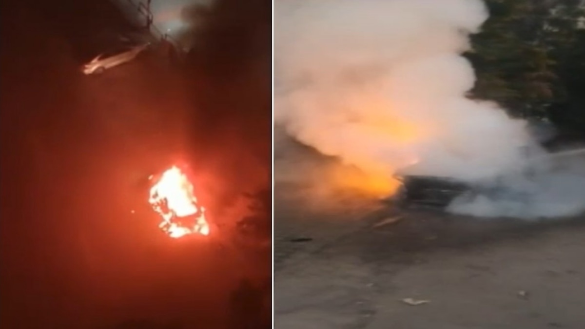 कार में लगी आग, दो लोगों की मौत (Photo Aajtak).