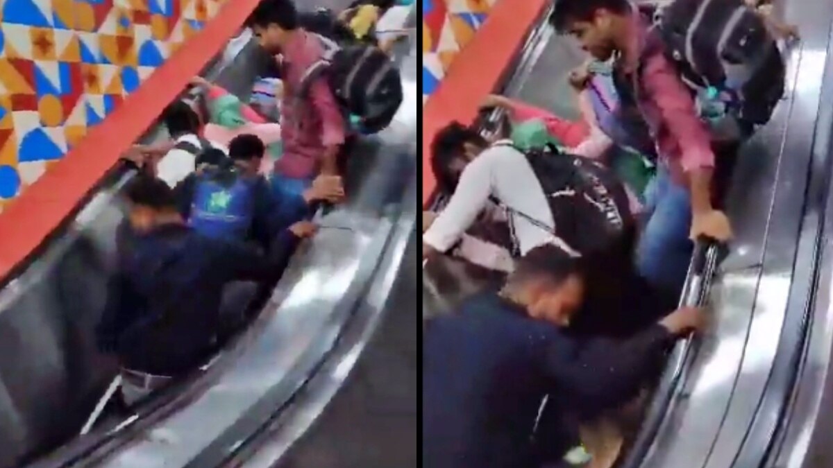 आगरा: एस्केलेटर में फंसे रेल यात्री 