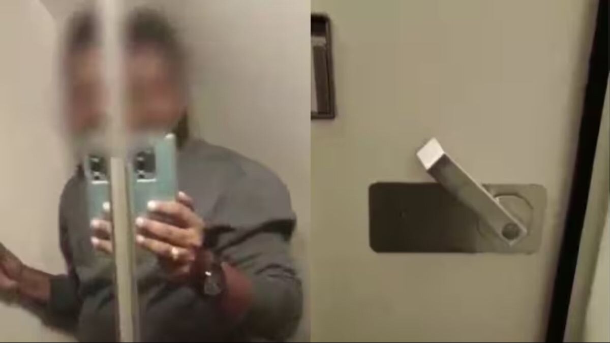 टॉयलेट में फंसा रहा यात्री. (Video Grab)