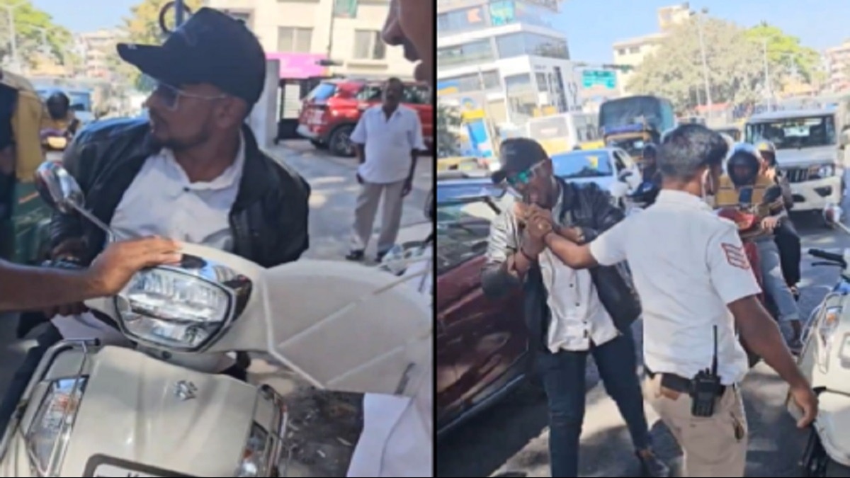 बिना हेलमेट पकड़ा तो ट्रैफिक पुलिस से भिड़ गया युवक, दांतों से चबा डाली उंगली, VIDEO