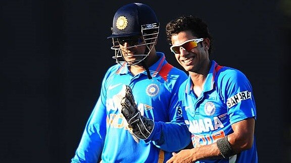 Manoj Tiwary-MS Dhoni (FILE/AFP) 