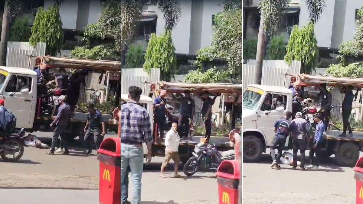 क्रेन ने उठाई बाइक तो टोइंग वैन के नीचे लेट गया शख्स, Video Viral