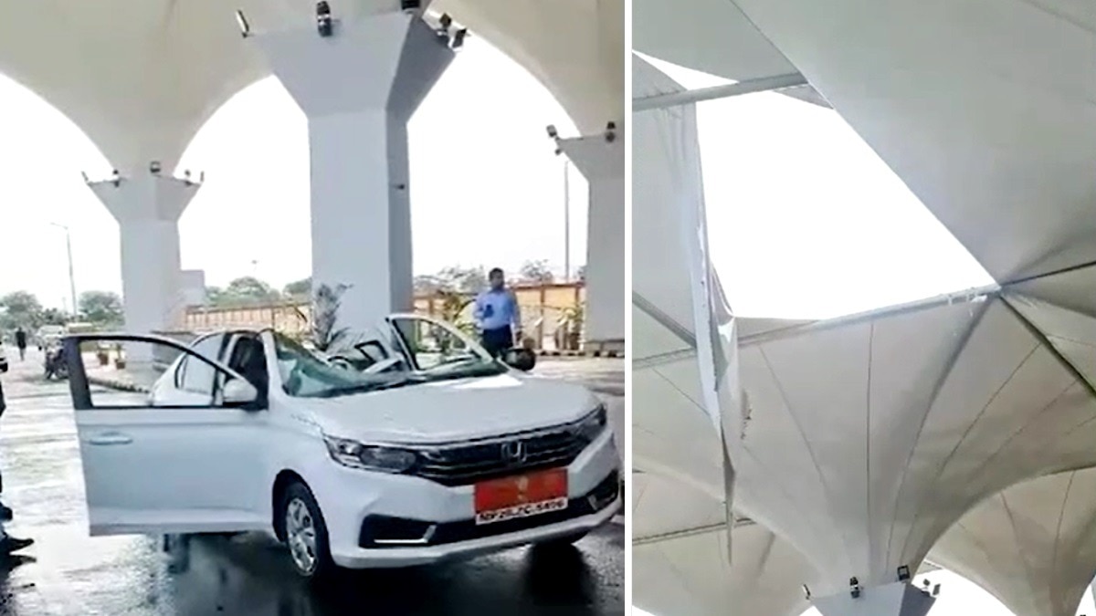 कैनोपी टेंट का हिस्सा गिरने से क्षतिग्रस्त कार. 