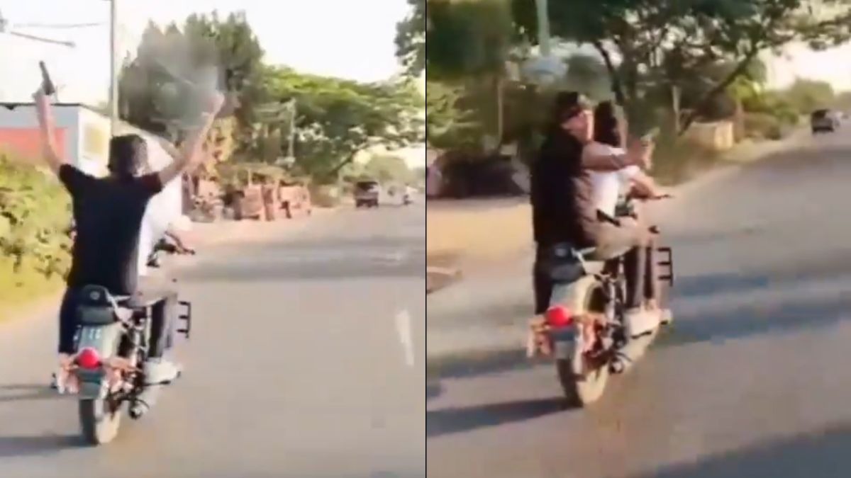 बाइक पर तमंचे लहराकर फायरिंग करता युवक. (Video Grab)