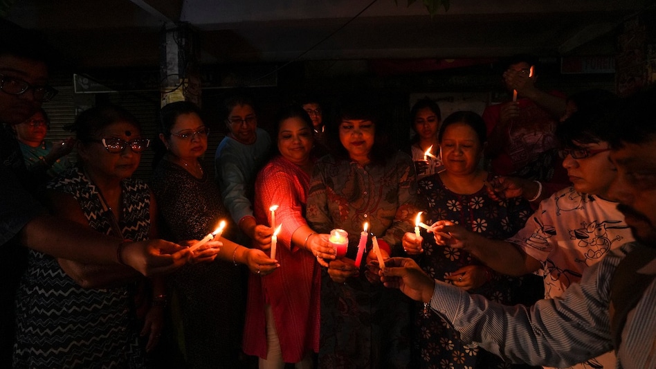 Candle march in Kolkata (PTI Photo/Swapan Mahapatra) Candle march in Kolkata (PTI Photo/Swapan Mahapatra)