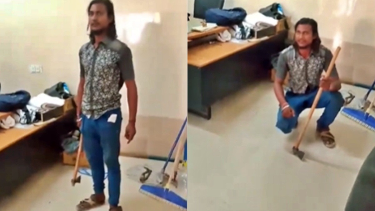 बांदा: हाथ में कुल्हाड़ी लिए धमकाता युवक 