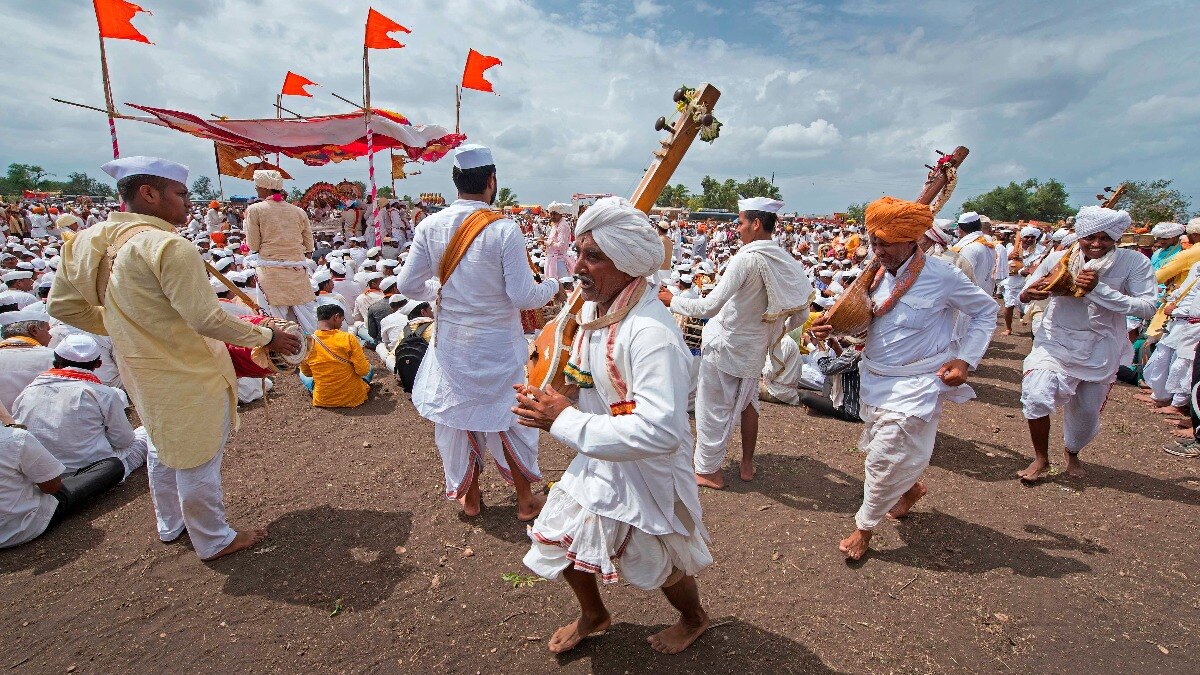 Warkari or Pilgrim men performing kirtan near Pune, Maharashtra, India, asia. (Photo by: Hira Punjabi/Avalon/Universal Images Group via Getty Images)