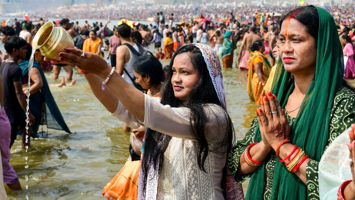 प्रयागराज कुंभ में महिला श्रद्धालु (फोटो- पीटीआई)