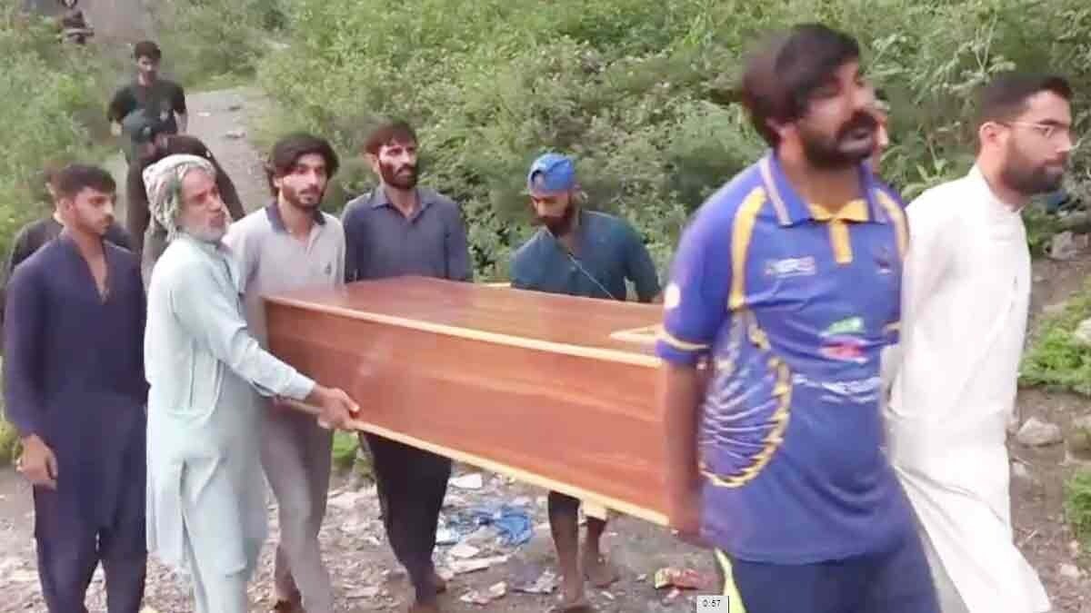 Victim's coffin moved away in Pakistan-controlled Kashmir after India fired missiles across border