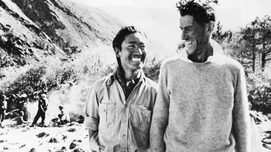 Smiling victors Sherpa Tenzing (Left) and Edmund Hillary 