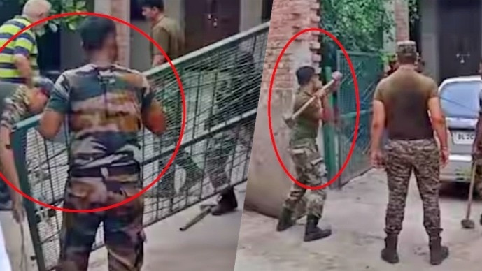 बागपत में हथौड़े से तोड़फोड़ करते कर्नल के फौजी दोस्त