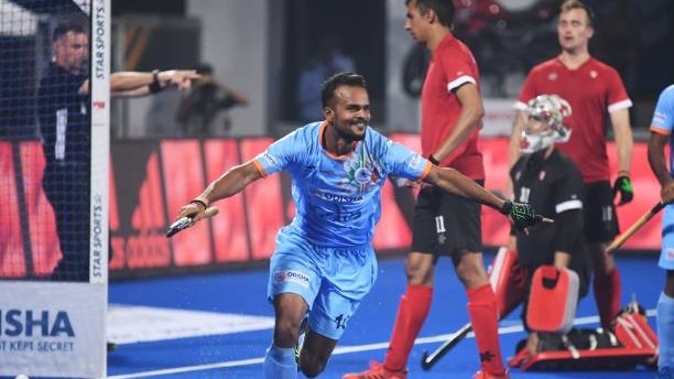Lalit Upadhyay celebrates after scoring a goal.