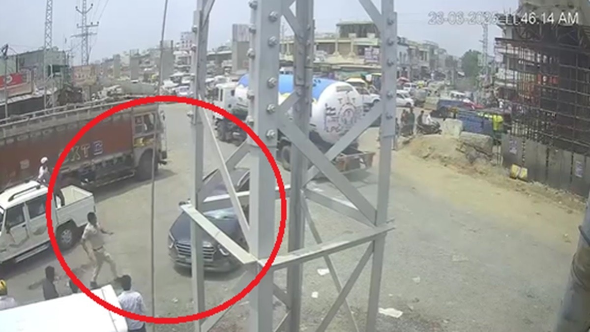 man runs car over policeman