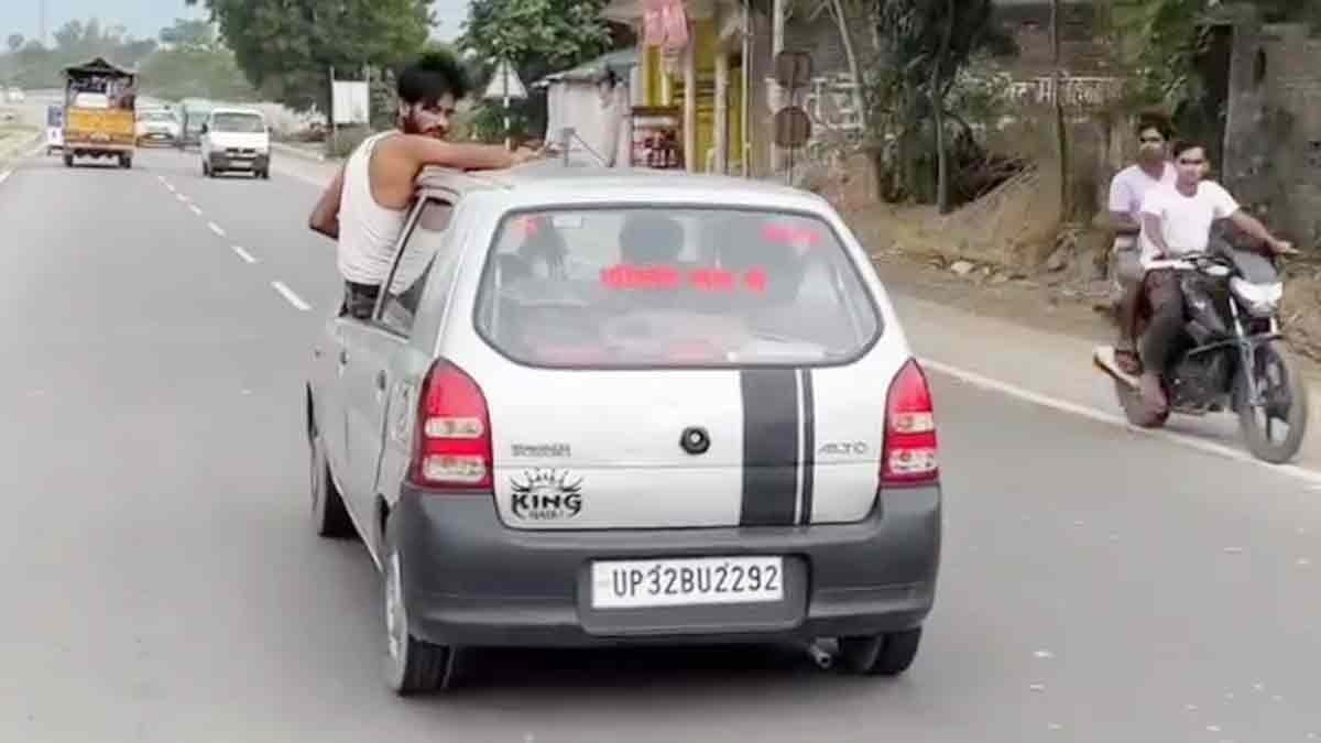 a youth did a stunt with a moving car the vehicle with police logo 