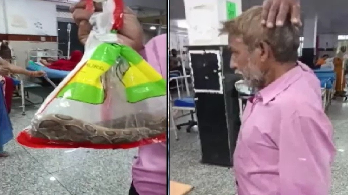 Man with a snake in polybag in hand