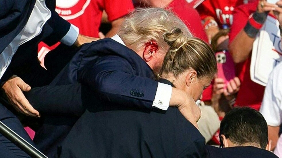Woman giving shoulder to Trump after firing