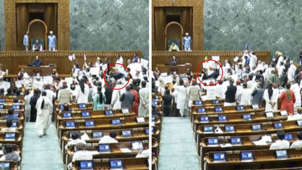 parliament black gamosa protest in front of chair