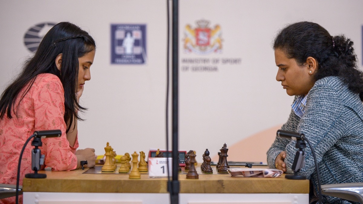 Divya Deshmukh, left, and Koneru Humpy.