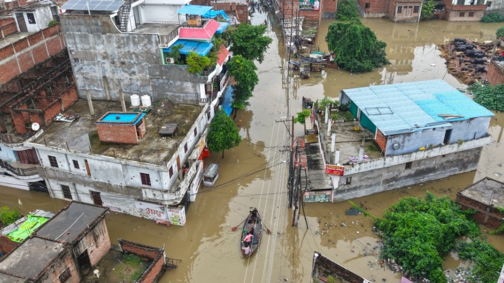 An aerial view of a residential area inundated with swollen Ganga river at Salori area, in Prayagraj (PTI Photo)