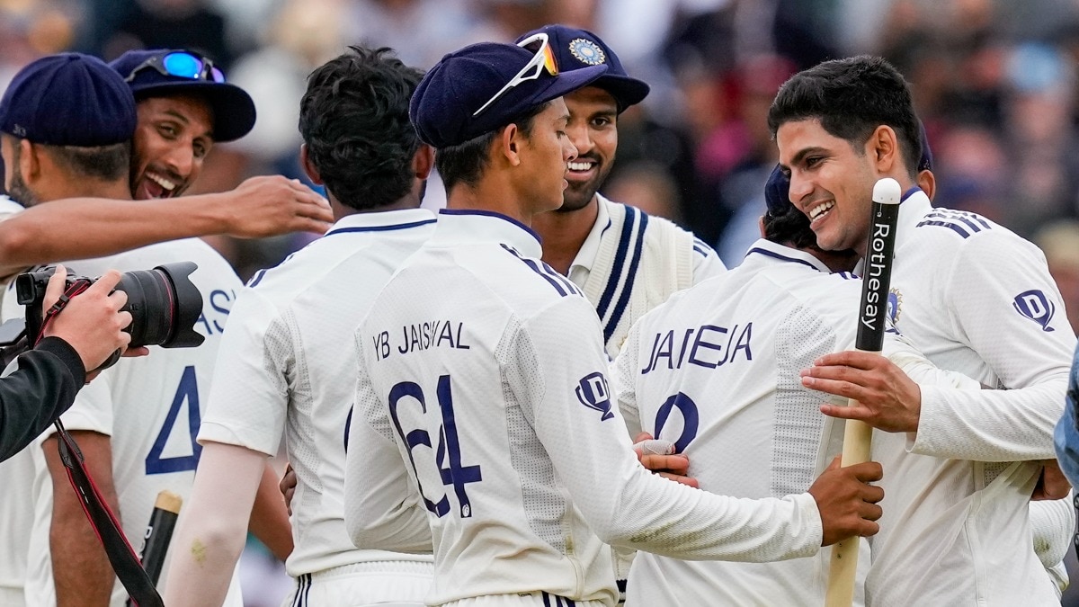 Shubman Gill with teammates celebrate following India's win.