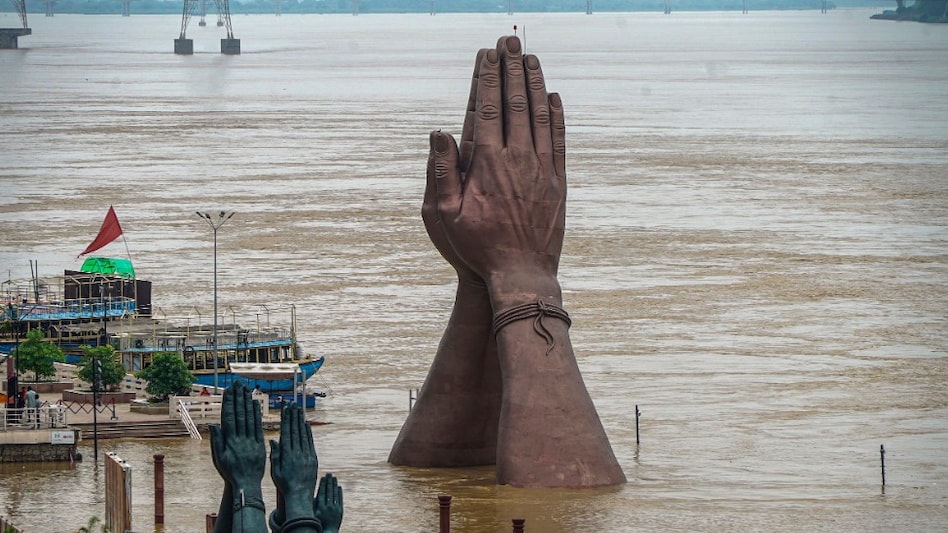 Namo Ghat inundated with water of the Ganga river after heavy rainfall, in Varanasi (PTI Photo)
